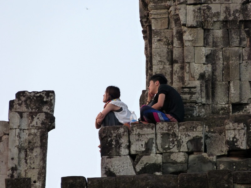 Finding a lonely spot on a crowded temple.